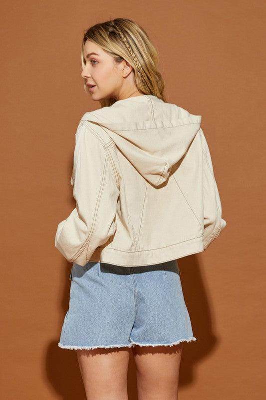 Back view of a Mustard Seed casual hooded jean jacket in beige with a relaxed fit and cropped design