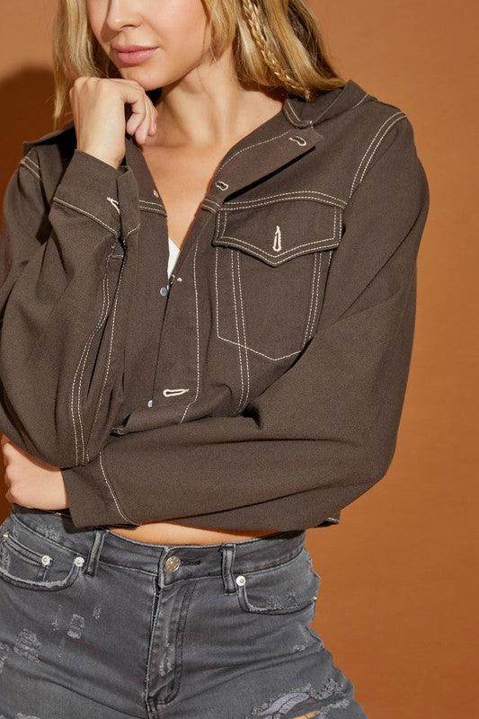 Stylish women's casual hooded jean jacket in brown with front pockets and contrasting stitching