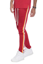 WEIV casual rainbow tape sweatpants in red with white drawstrings and side rainbow stripe detailing