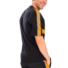 Men's black casual t-shirt for travel with stylish orange stripes on the sleeves