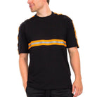 Black VacationGrabs casual t-shirt for travel featuring stylish orange stripes on sleeves