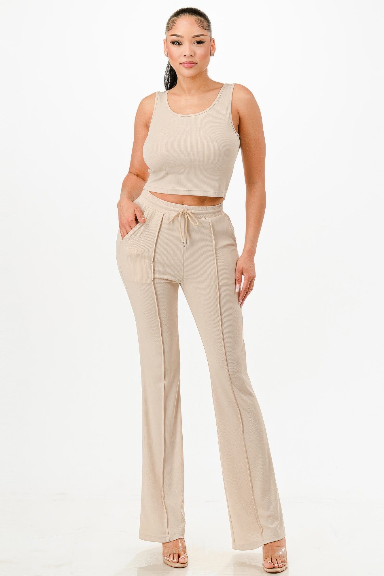 Beige casual two piece outfit for summer with sleeveless crop top and drawstring pants