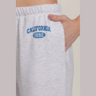 VacationGrabs women's casual vacation lounge pants in light gray with California 1992 print and elastic waistband