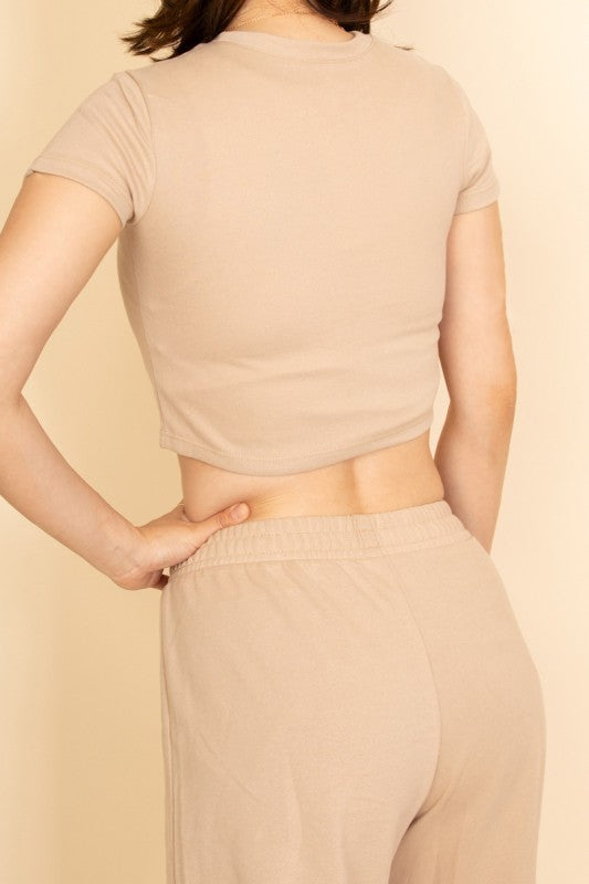 Capella beige casual wide-leg pants outfit shown from back with crop top and elastic waistband pants
