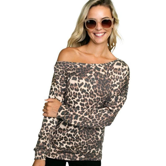 Cheetah Print One Shoulder Top by e Luna featuring a stylish off-shoulder design and soft fabric