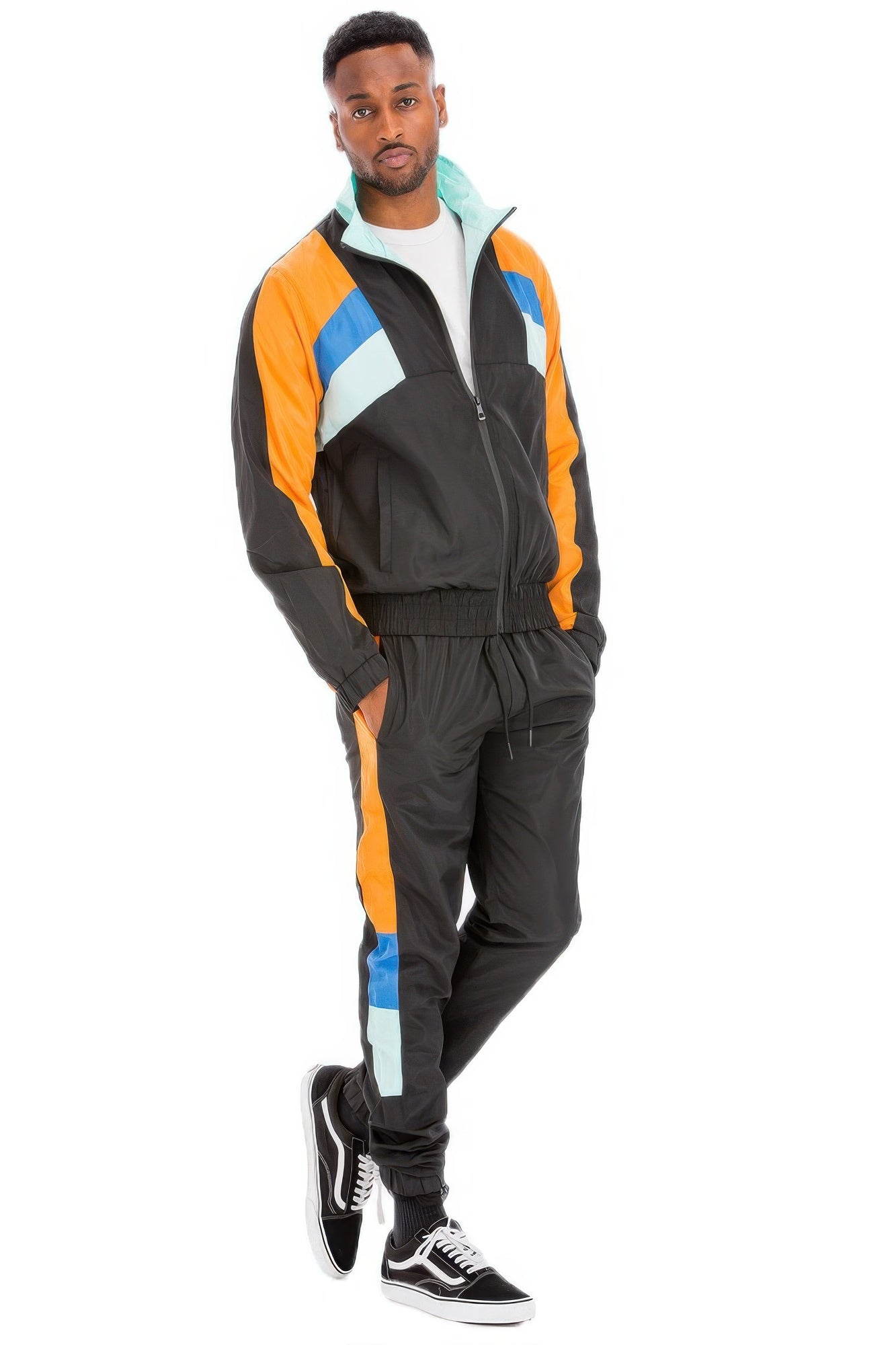 Stylish chevron track suit for men in black, orange, and teal with zip-up jacket and matching pants
