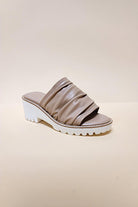 Taupe chunky heel slip-on sandals with ruched strap and white sole by Let's See Style