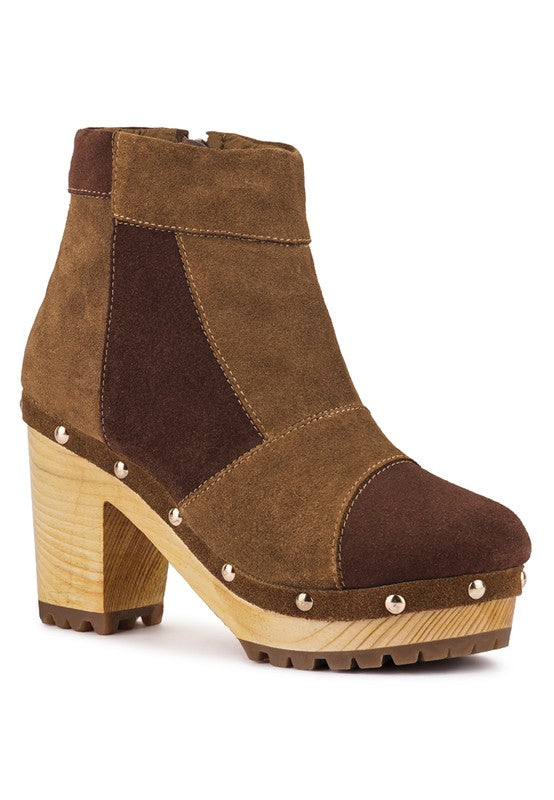 Stylish chunky heel suede boots for women with unique design and comfortable fit for everyday wear.
