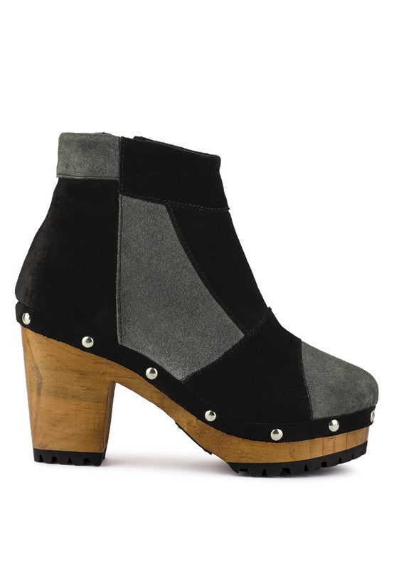 Stylish chunky heel suede boots for women in black and gray with wooden sole and decorative studs