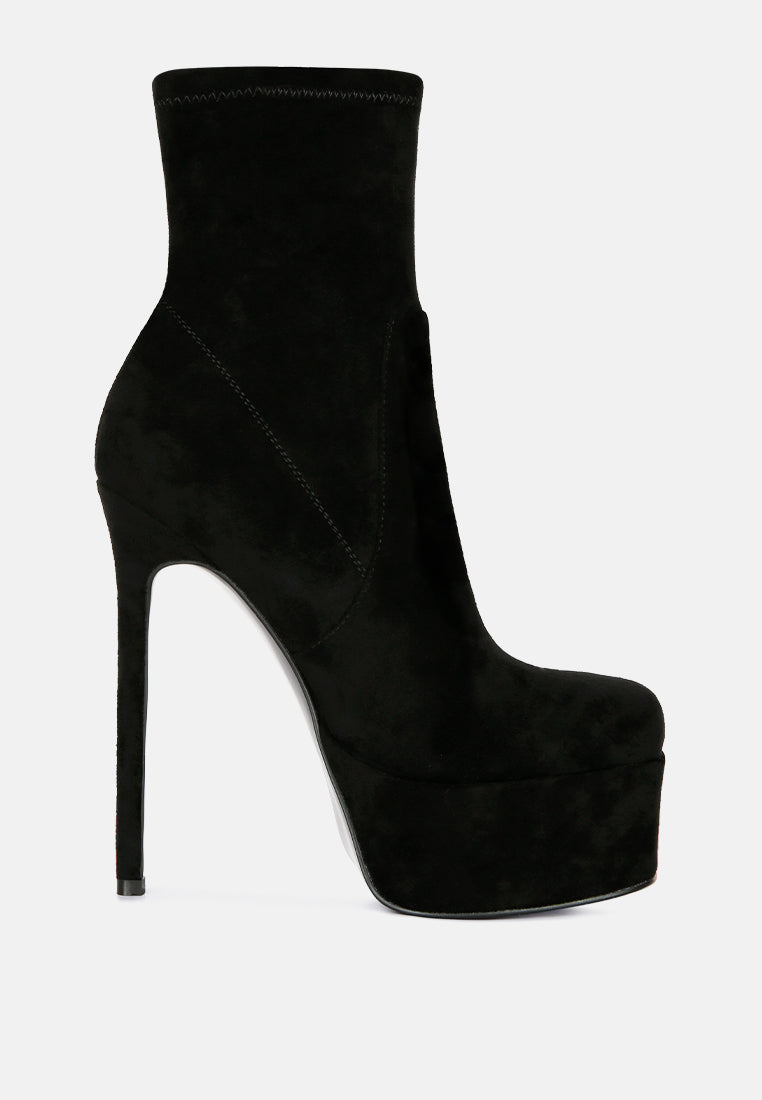 Black high-heeled platform sock boot on a white background