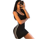 Black clubwear short dress for women with white side stripes worn by woman taking a mirror selfie