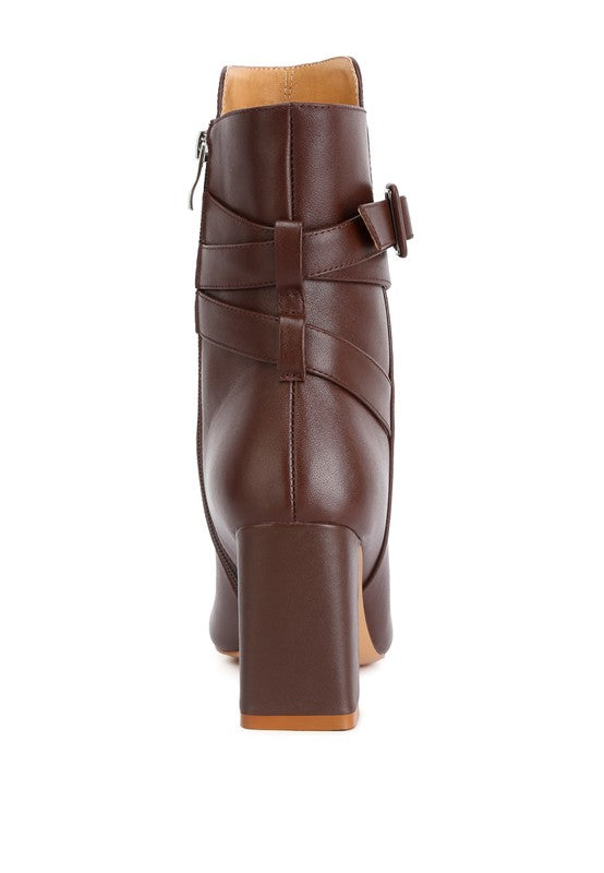 Brown Rag Company cobra buckle boots with a stylish block heel and unique back strap design