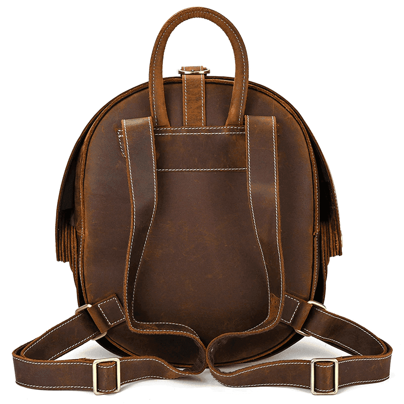 Collapsible travel backpack leather in dark brown with sturdy shoulder straps and top handle for easy carrying