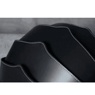 Collapsible travel backpack leather in black with sleek design and durable stitching for easy storage