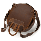 Collapsible travel backpack leather with durable straps and spacious interior for versatile travel needs