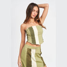 Emory Park color block corset top in olive green with a stylish frayed hem design
