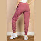VacationGrabs women's comfortable travel joggers in mauve color with cuffed ankles