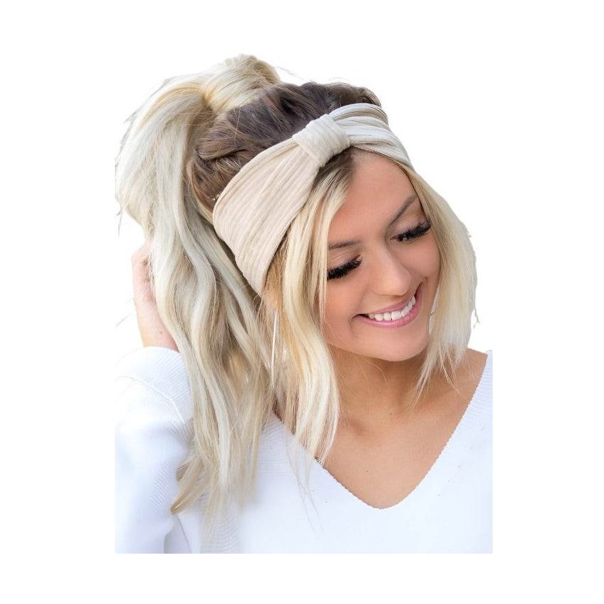Aili's Corner corduroy hair wrap in light beige adding style to a woman's hairstyle