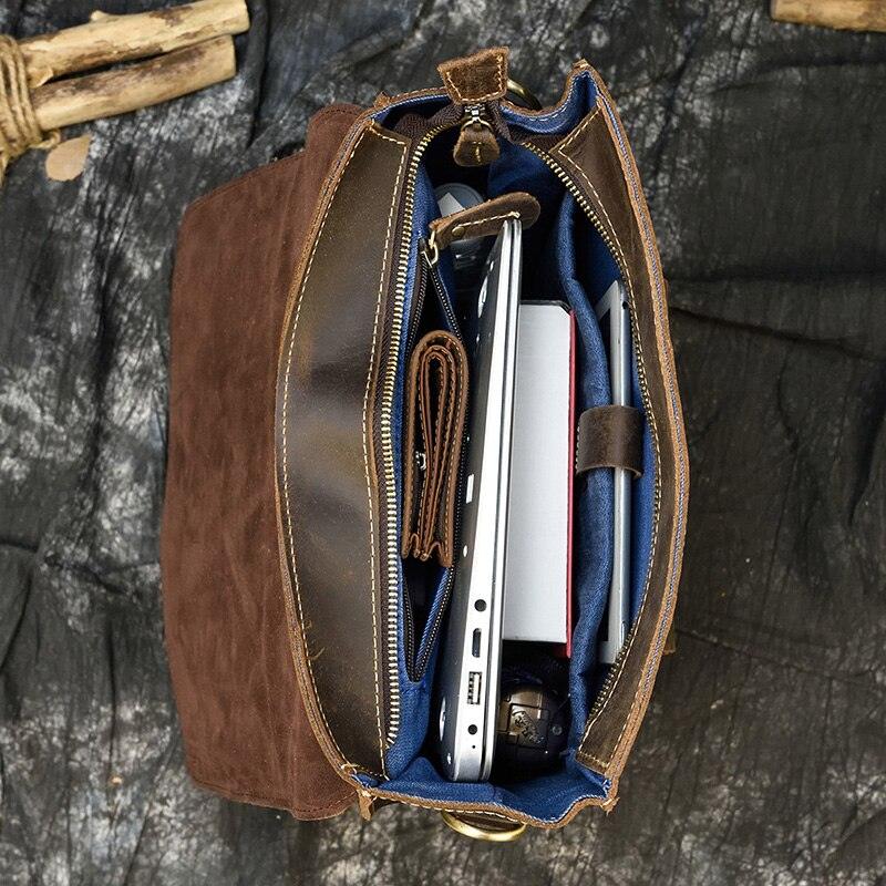 Open view of a crazy horse leather backpack 14 inch featuring organized compartments for laptops and accessories