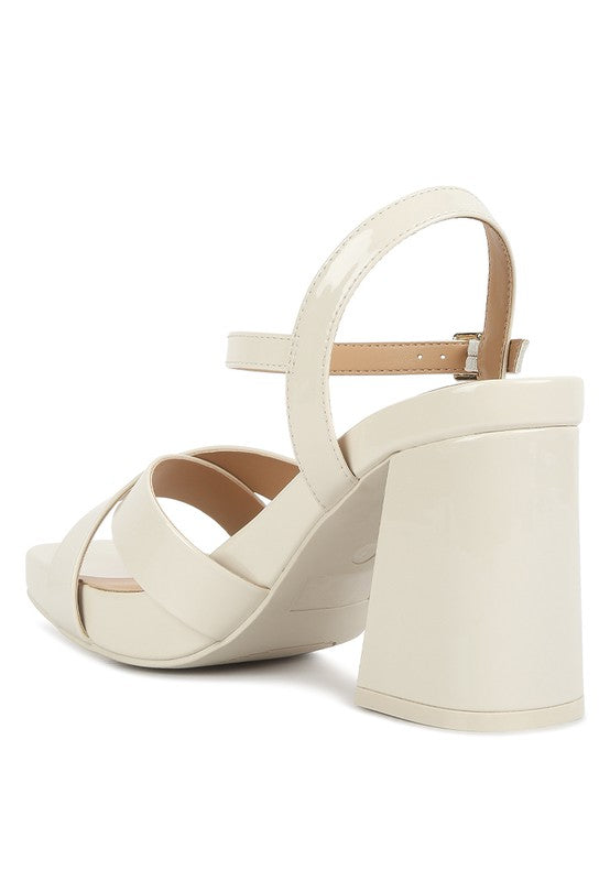 Women's criss cross block heel sandals in beige, perfect for summer outings