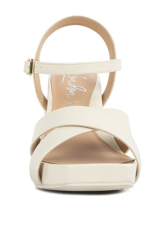 Women's criss cross block heel sandals in light beige, perfect for summer outings