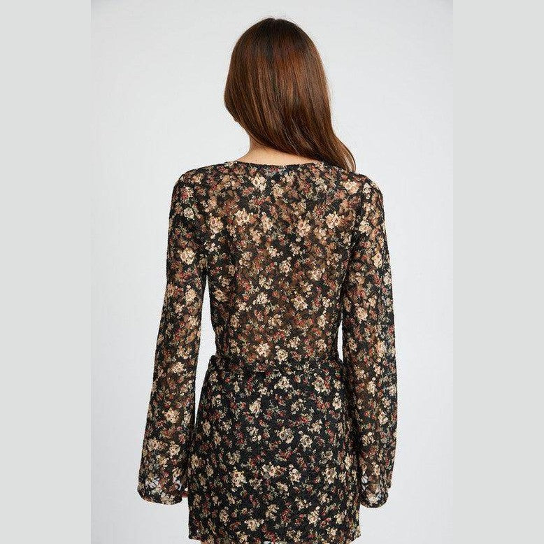 Back view of Emory Park cropped floral summer blouse with long sleeves and delicate floral print