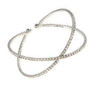 Bella Chic crossed bangle jewelry featuring a sleek design with sparkling rhinestones