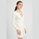 Emory Park Women's cut out detail dress in white with long sleeves and a wrap design