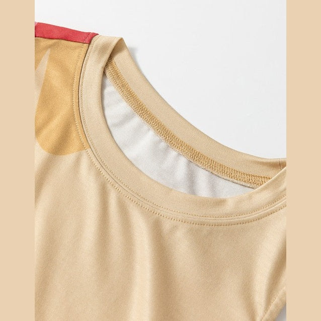 Close-up of a beige women's dress neckline highlighting the comfortable fabric of a daisy print tank dress