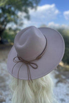 Dandy Panama hat vacation style in soft pink with braided detail and bow for sunny outings