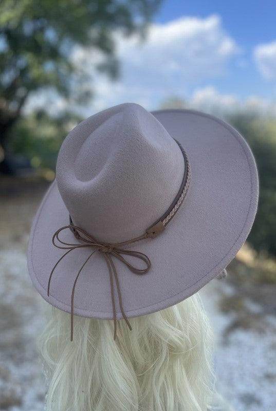 Dandy Panama hat vacation style in soft pink with braided detail and bow for sunny outings