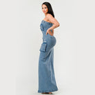 Athina strapless jean maxi dress with cargo pockets worn by woman posing sideways