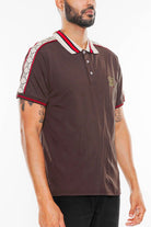 WEIV designer brown polo shirt with patterned shoulder stripes and red white collar details