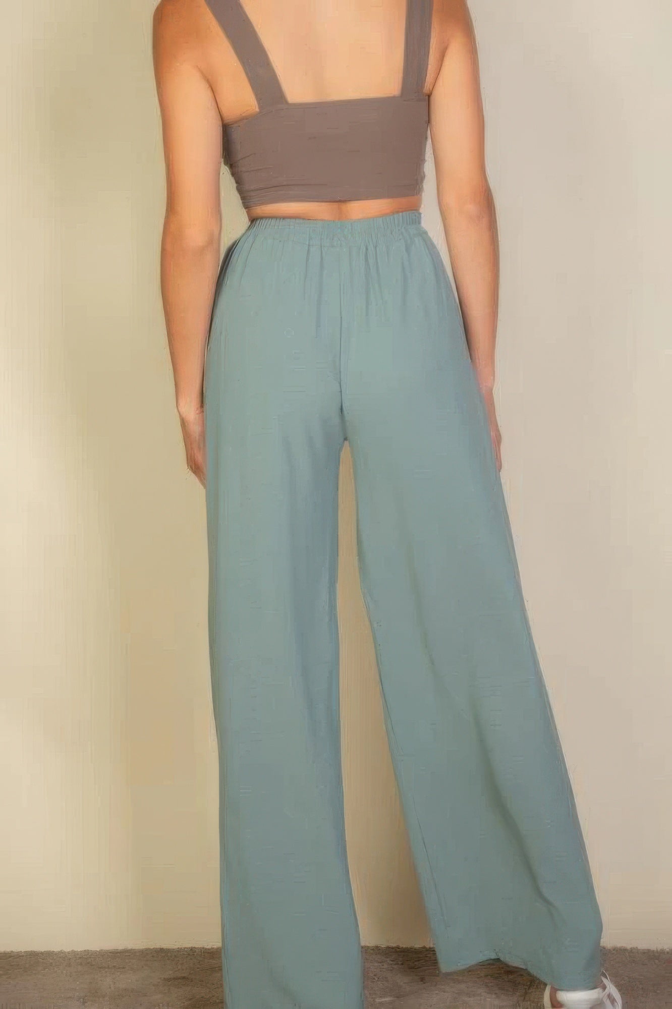 VacationGrabs women's light blue drawstring waist wide leg pants shown from the back