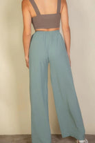 VacationGrabs women's light blue drawstring waist wide leg pants shown from the back