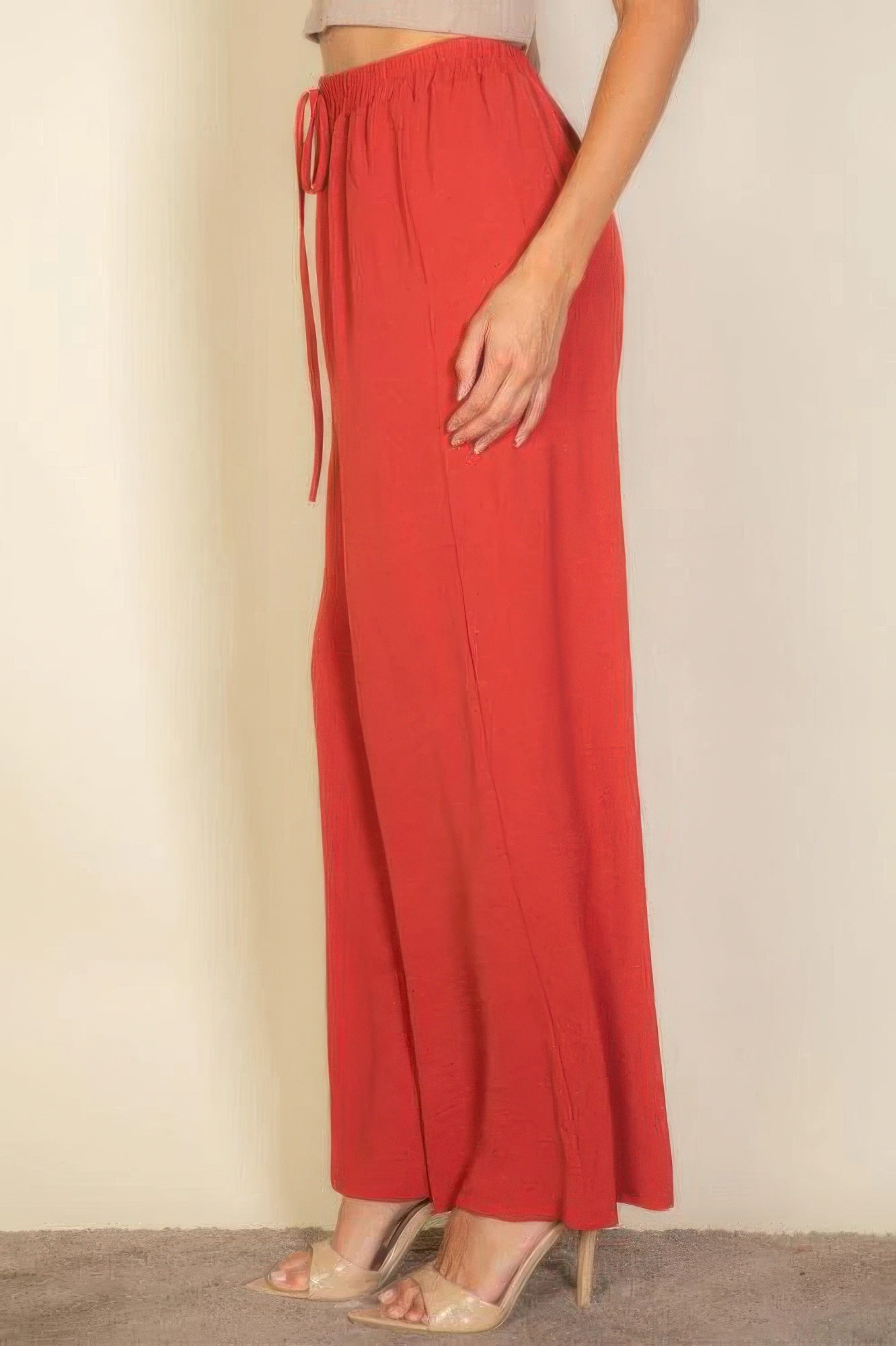 Women's red drawstring waist wide leg pants from VacationGrabs styled with heels