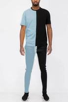 Men's activewear dust blue black pants set featuring a stylish color block design for comfort and style