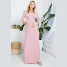 Elegant dusty pink maxi dress from e Luna featuring a flattering wrap design and three-quarter sleeves