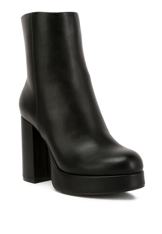 Stylish black chunky heel ankle boots for women with a sleek design and elevated platform