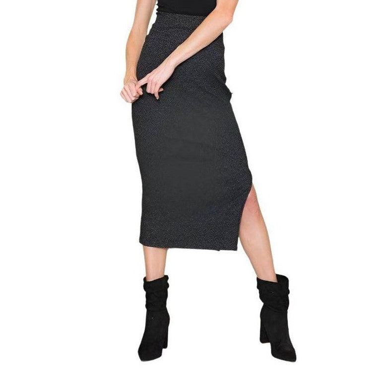 Black elegant slit skirt from Orange Farm Clothing featuring a stylish design and fitted silhouette