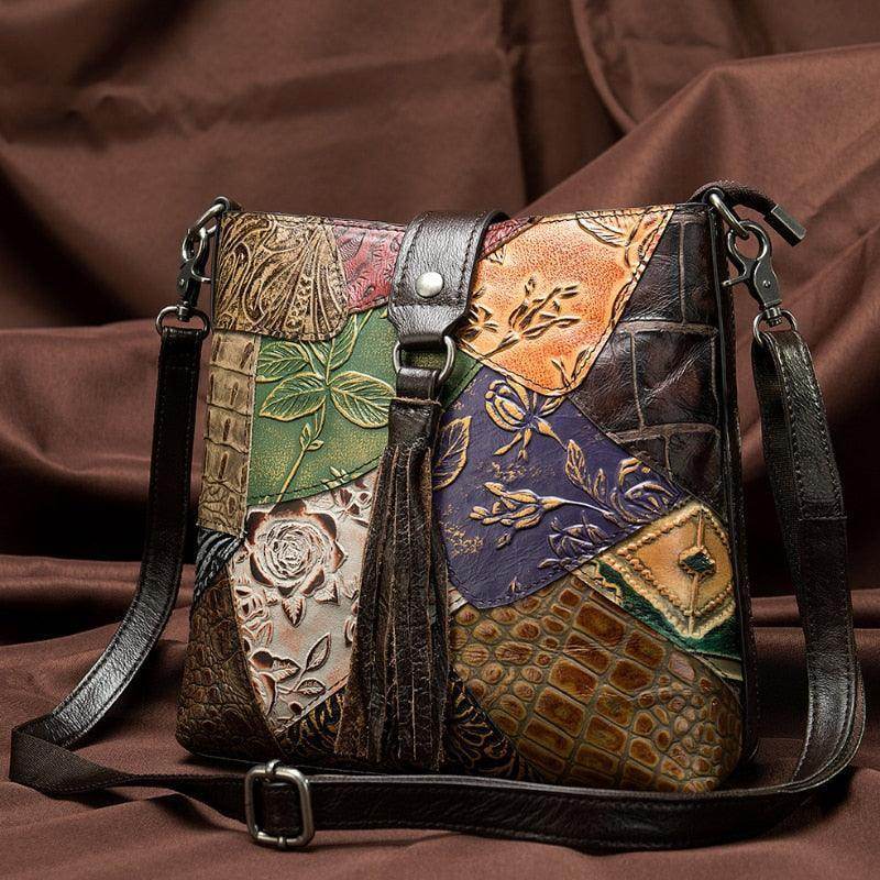 VacationGrabs ethnic patchwork handbag with unique leather designs and adjustable shoulder strap