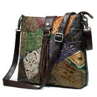 Colorful ethnic patchwork handbag with intricate designs and adjustable shoulder strap