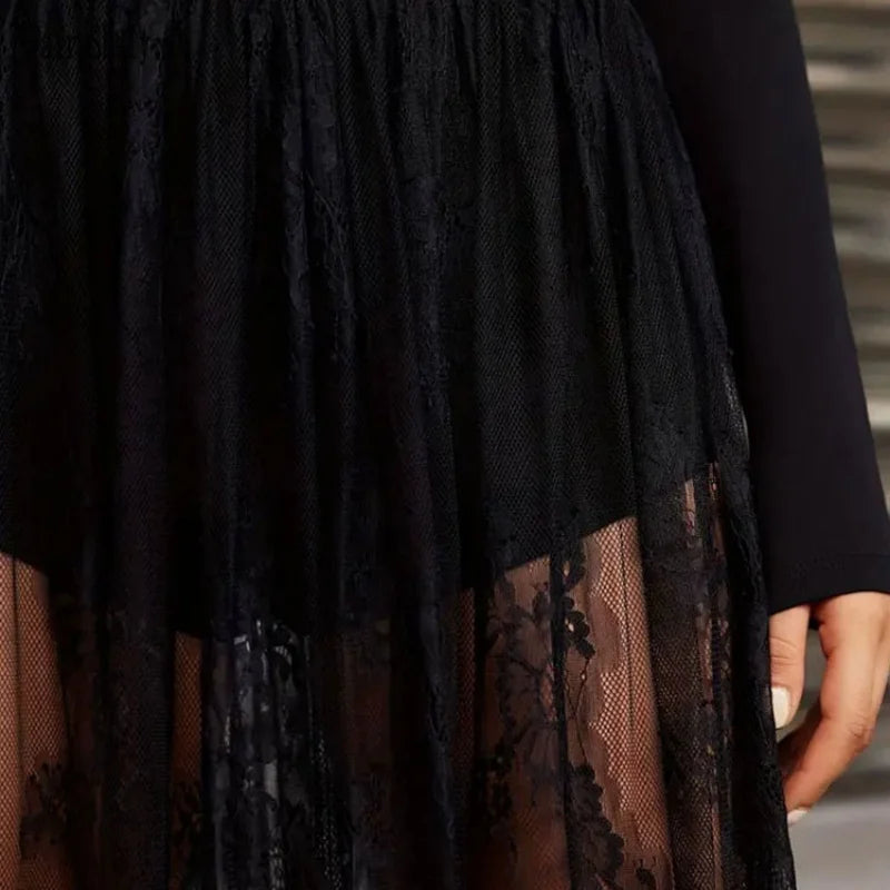 Close-up of a black sheer lace skirt with shorts featuring delicate floral lace overlay