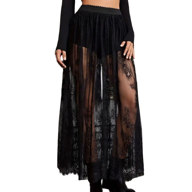 Black sheer lace skirt with shorts worn by model in black long sleeve top and boots
