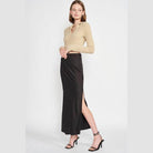 Emory Park orange collared top fashion paired with a black satin skirt for a chic look