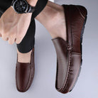 Brown breathable mens moccasins with a sleek design for comfortable daily wear