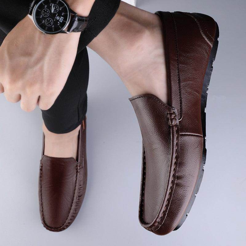 Brown breathable mens moccasins with a sleek design for comfortable daily wear