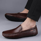 Brown breathable mens moccasins with a sleek design for casual and comfortable wear