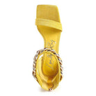 Bright yellow Rag Company fashion chain strap heels with a stylish chunky design.