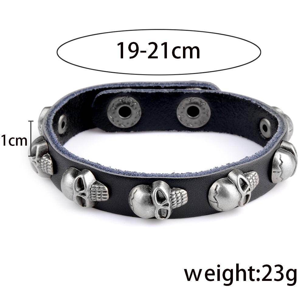 Men's fashion punk rivet bracelets in black leather featuring skull accents for a bold style